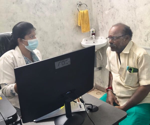 Doctor consulting a patient for diabetic foot care in Madurai