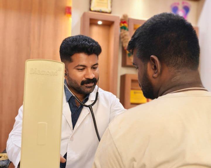 Dr. Durai providing diabetic and foot care consultation in Medavakkam, Chennai